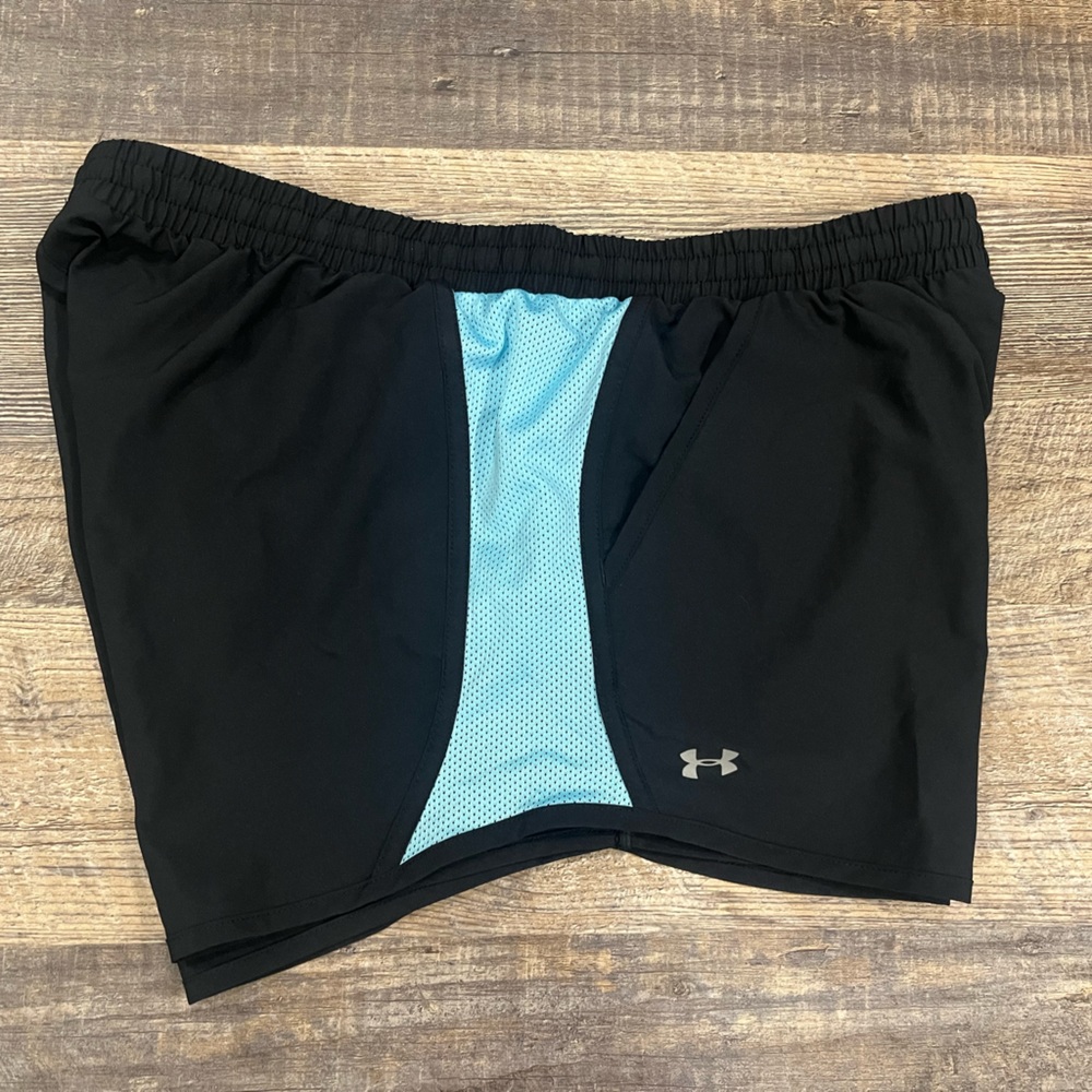 Under Armour Women’s size Large shorts - Like New - black with blue sides